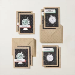Image shows two of each of four different cards featuring a globe and a pocket watch. Colors are tan, black, blue & maroon.  These are the cards featured in the Timeless Greeting Card Making kit from Stampin'Up